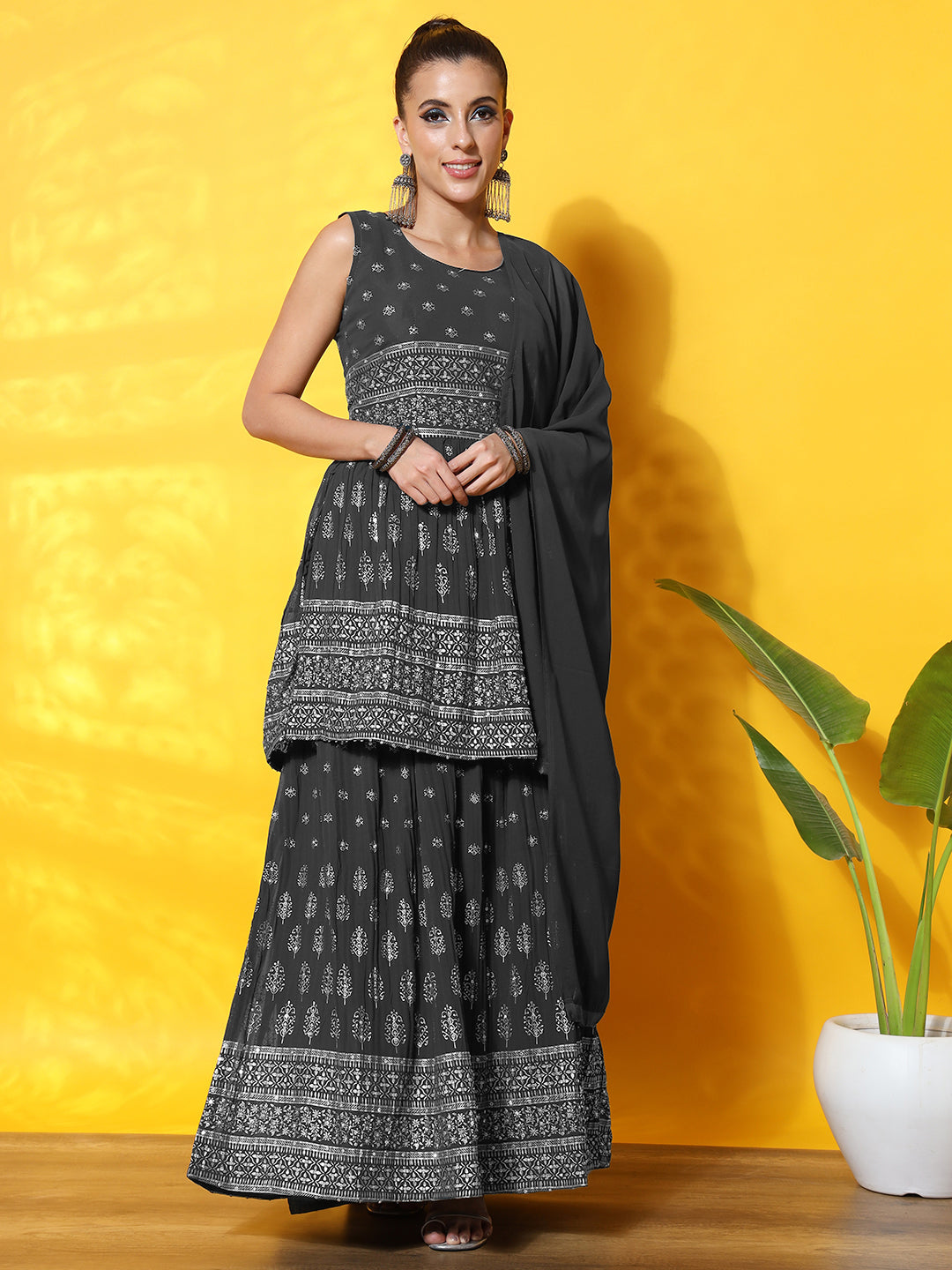 Chhabra 555 Foil Print Peplum Style Georgette Gharara Set with Peplum Style Pleated Tassled Kurta