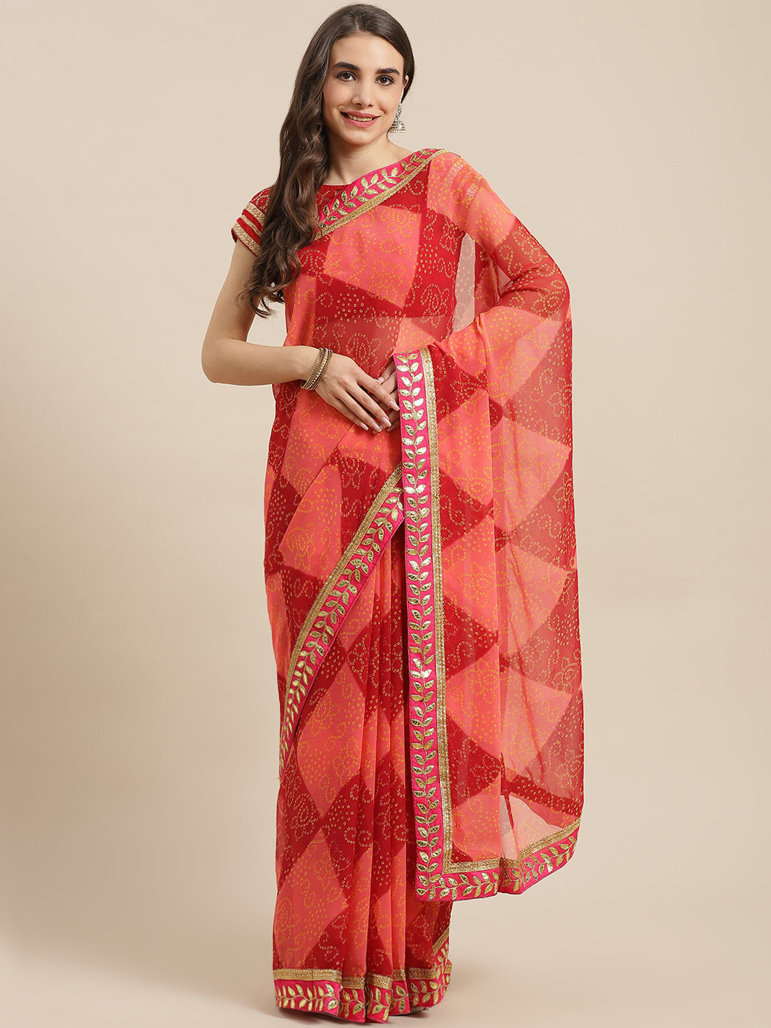 Chhabra 555 Pink & Maroon Georgette Bandhani Print Saree Embellished & Gota Patti Jaipuri Border

Color: Pink & Maroon

Type: Bandhani Sarees

Pattern: Printed

Pattern Type: Bandhani

Ornamentation: Gotta Patti

Border: Embroidered

Fabric: Georgette

Saree length: 5.40 mtr., Width: 1.10 mtr, Blouse length: 0.70 mtr
Dry Clean

The CAD image gives a detailed look of the actual blouse piece that comes with this saree. The blouse used by the model in the pictures is only for styling purpose.