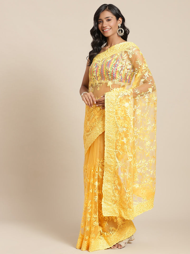 Yellow Net Resham Embroidered Saree with Scalloped border and crystal Embellishments