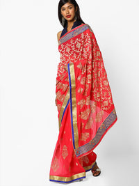 Coral Pink Zari Embroidered Georgette Saree With Ethnic Zaal Motifs and Contrast Border