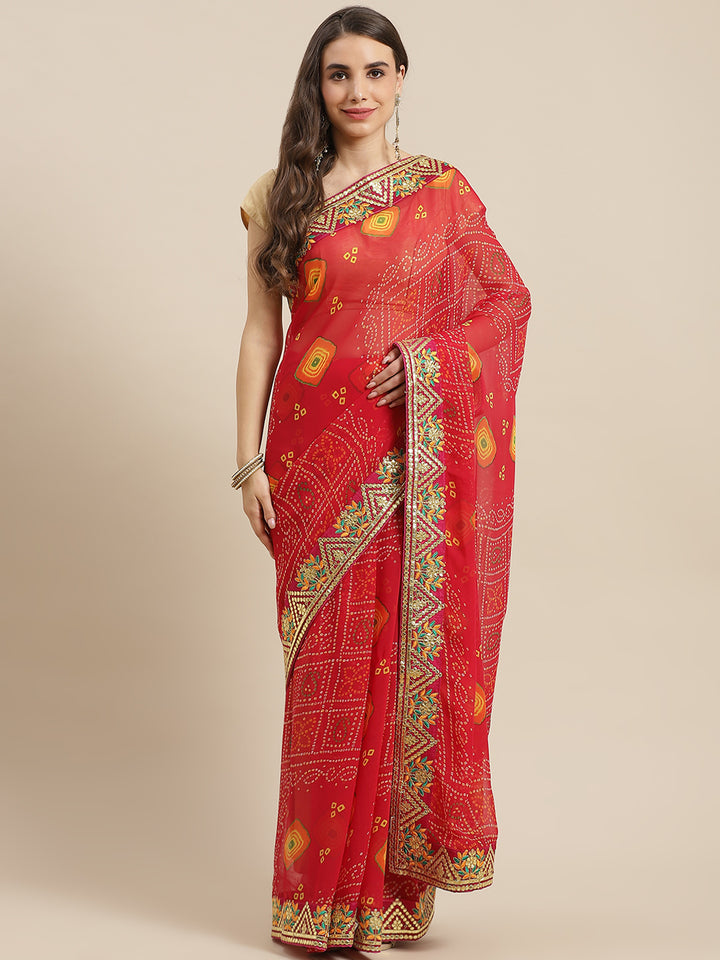 Chhabra 555 Red Jaipur Bandhani Prints Geogette Saree With Resham & Gota Patti Embroidery Border

Color: Red

Type: Bandhani Sarees

Pattern: Printed

Pattern Type: Bandhani

Ornamentation: Gotta Patti

Border: Embroidered

Fabric: Georgette

Saree length: 5.40 mtr., Width: 1.10 mtr, Blouse length: 0.70 mtr
Dry Clean

The CAD image gives a detailed look of the actual blouse piece that comes with this saree. The blouse used by the model in the pictures is only for styling purpose.