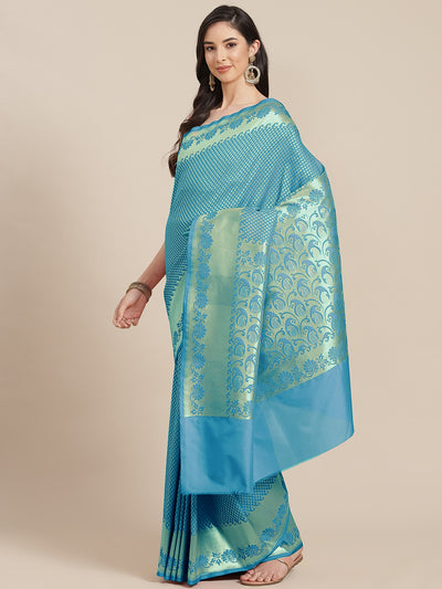 Chhabra 555 Turquoise Handloom Banarasi Wedding Silk Saree With Embellished Gold Zari Weaving 

Color: Turquoise Blue

Type: Banarasi Sarees

Pattern: Woven Design

Pattern Type: Woven Design

Ornamentation: Zari

Border: Zari

Fabric: Silk Blend

Saree: 5.4 mtr., Width: 1.1 mtr, Blouse: 0.7 mtr
Dry Clean Only

The CAD image gives a detailed look of the actual blouse piece that comes with this saree. The blouse used by the model in the pictures is only for styling purpose.