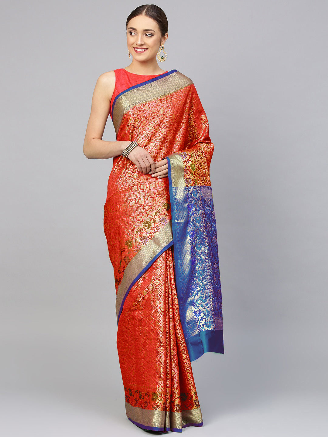 Chhabra 555 Coral Banarasi Silk saree with handloom woven floral pattern and meenakari border
