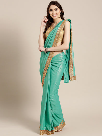 Chhabra 555 Turquoise Stretch georgette Saree with Pearl and Crystal Embellished border