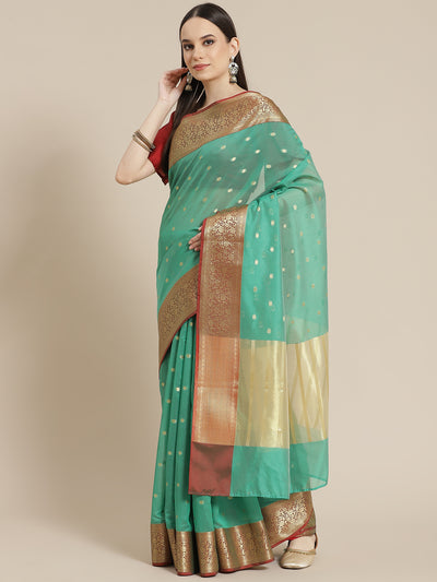 Chhabra 555 Green Traditional Maheshwari Silk Banarasi Saree with Gold Zari woven Border 

Color: Green

Type: Maheshwari Sarees

Pattern: Woven Design

Pattern Type: Woven Design

Ornamentation: Zari

Border: Woven Design

Fabric: Silk Cotton

Saree length: 5.60 mtr., Width: 1.10 mtr, Blouse length: 0.85 mtr
Dry Clean only

The CAD image gives a detailed look of the actual blouse piece that comes with this saree. The blouse used by the model in the pictures is only for styling purpose.