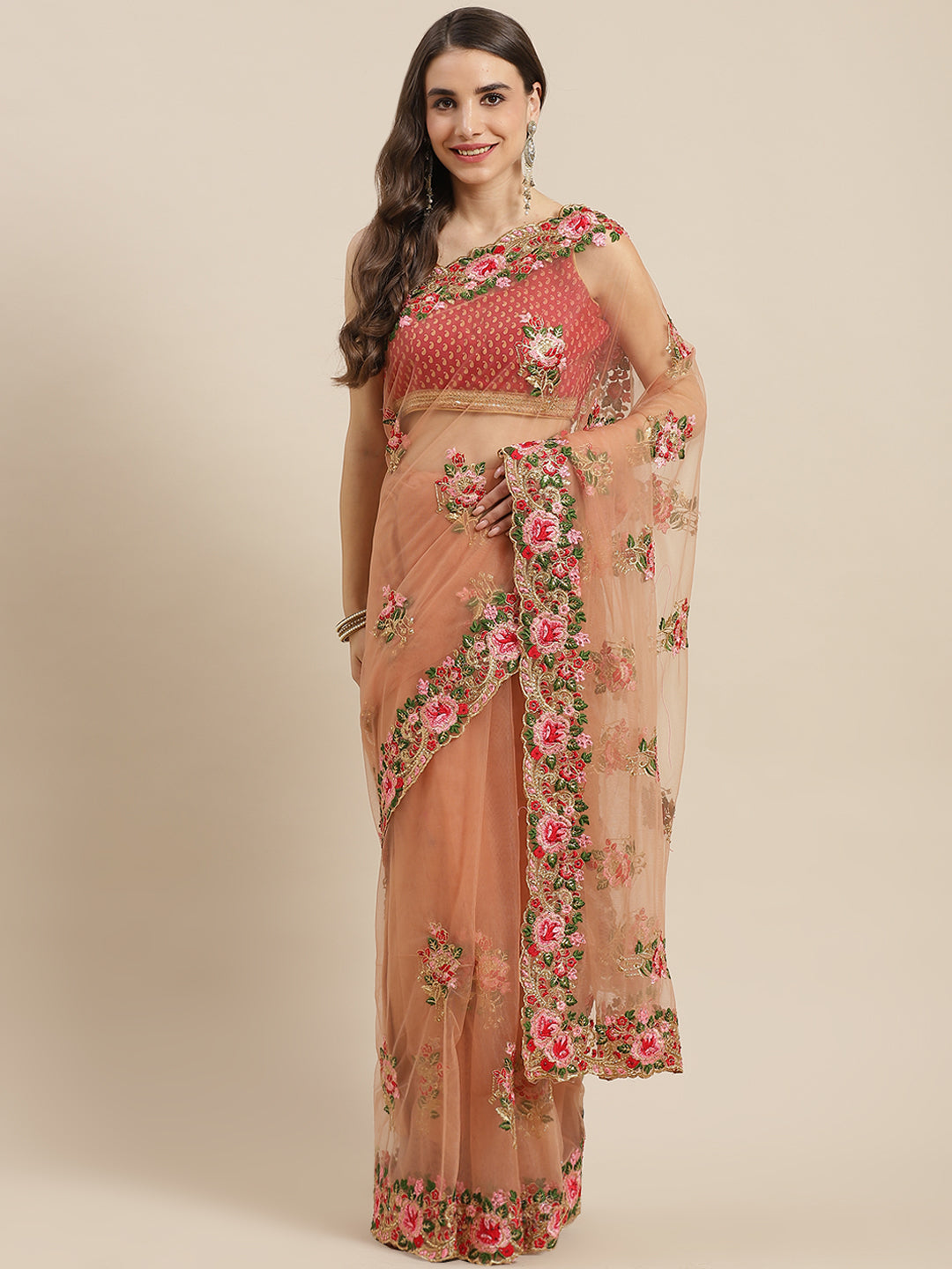 Chhabra 555 Net Floral Zari & Resham Embroidered Saree Embellished With Stone Work

Color: Pink

Type: NA Sarees

Pattern: Embroidered

Pattern Type: Floral

Ornamentation: Zari

Border: Embroidered

Fabric: Net

Saree length: 5.50 mtr., Width: 1.10 mtr, Blouse length: 0.70 mtr
Dry Clean

The CAD image gives a detailed look of the actual blouse piece that comes with this saree. The blouse used by the model in the pictures is only for styling purpose.
