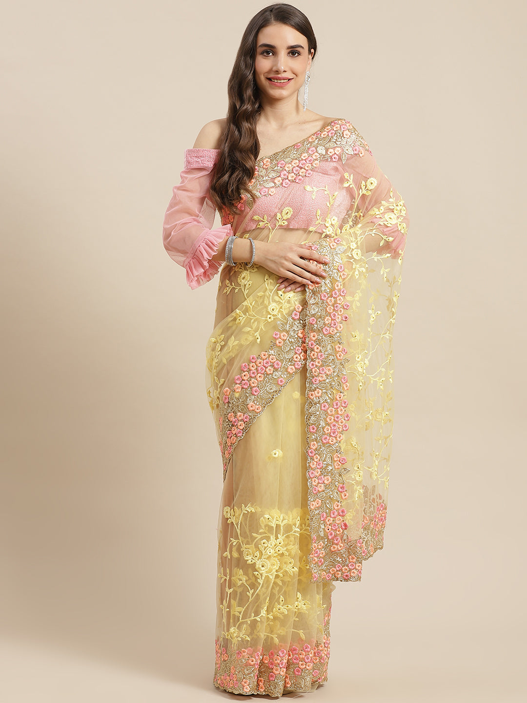 Chhabra 555 Pastel Net Zari & Resham Floral Embroidery Saree With Crystal & Scalloped Cutwork Border

Color: Yellow

Type: NA Sarees

Pattern: Embroidered

Pattern Type: Floral

Ornamentation: Zari

Border: Embroidered

Fabric: Net

Saree length: 5.50 mtr., Width: 1.10 mtr, Blouse length: 0.70 mtr
Dry Clean

The CAD image gives a detailed look of the actual blouse piece that comes with this saree. The blouse used by the model in the pictures is only for styling purpose.