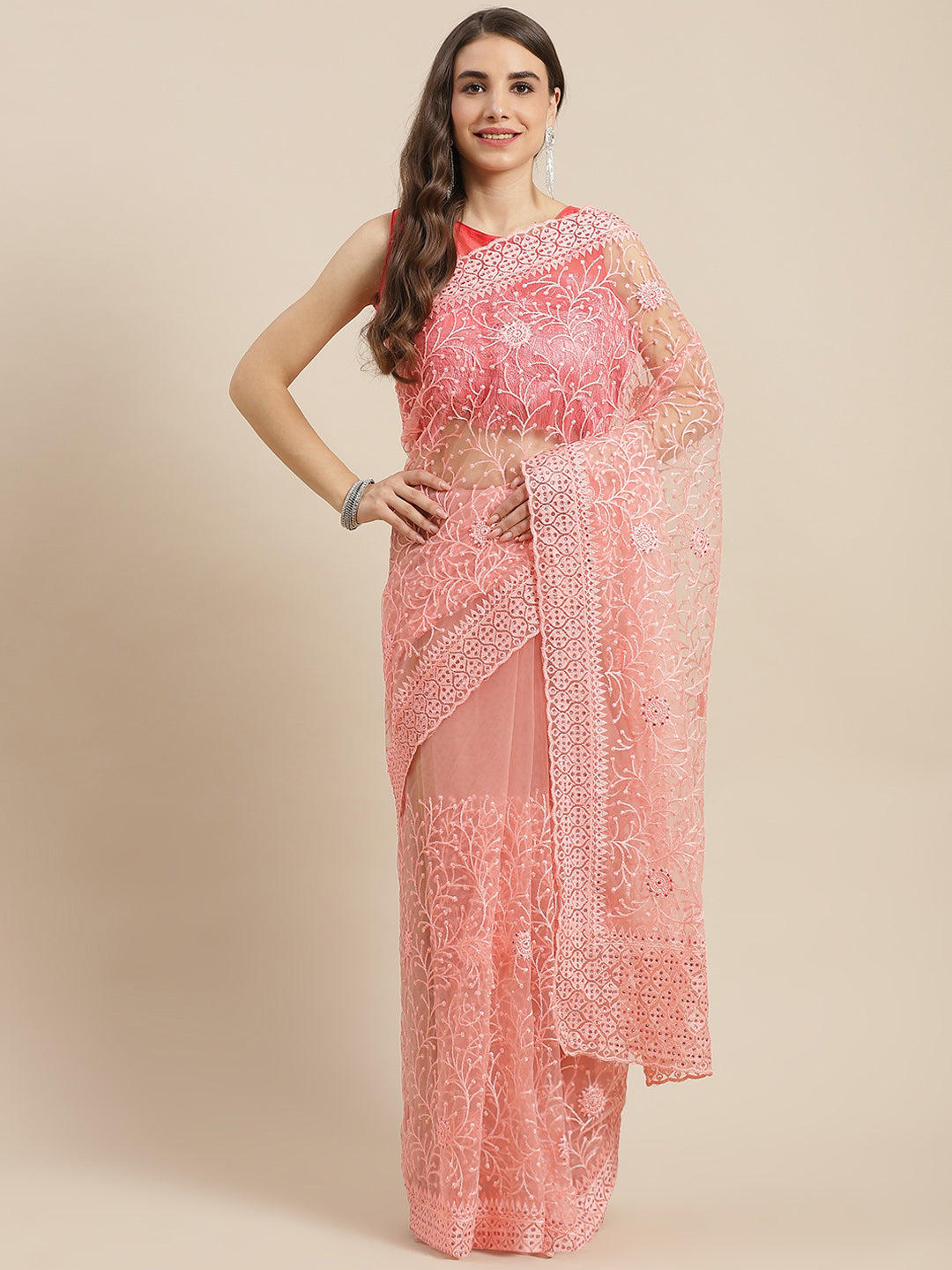 Chhabra 555 Pastel Peach Net Resham Embroidery Saree Embellished With Stone Work & Scalopped Border 

Color: Peach

Type: NA Sarees

Pattern: Embroidered

Pattern Type: Floral

Ornamentation: Beads and Stones

Border: Embroidered

Fabric: Net

Saree length: 5.50 mtr., Width: 1.10 mtr, Blouse length: 0.70 mtr
Dry Clean

The CAD image gives a detailed look of the actual blouse piece that comes with this saree. The blouse used by the model in the pictures is only for styling purpose.