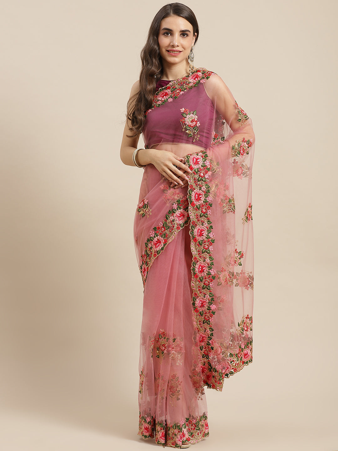 Chhabra 555 Net Floral Zari & Resham Embroidered Saree Embellished With Scalloped Cutwork Border

Color: Pink

Type: NA Sarees

Pattern: Embroidered

Pattern Type: Floral

Ornamentation: Zari

Border: Embroidered

Fabric: Net

Saree length: 5.50 mtr., Width: 1.10 mtr, Blouse length: 0.70 mtr
Dry Clean

The CAD image gives a detailed look of the actual blouse piece that comes with this saree. The blouse used by the model in the pictures is only for styling purpose.
