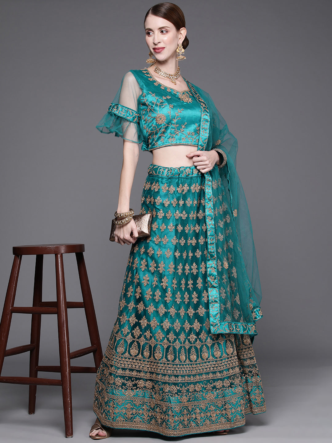 Chhabra 555 Semi-Stitched Gold Aari Embroidery Party Wear Net Lehenga Set with Embellished Dupatta