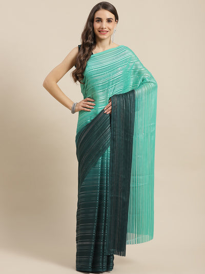 Chhabra 555 Teal Ombre Georgette Satin & Lurex Woven Saree With Sequence Embellished Blouse

Color: Teal

Type: NA Sarees

Pattern: Embellished

Pattern Type: Ombre

Ornamentation: Sequinned

Border: No Border

Fabric: Poly Georgette

Saree length: 5.40 mtr., Width: 1.10 mtr, Blouse length: 0.70 mtr
Dry Clean

The CAD image gives a detailed look of the actual blouse piece that comes with this saree. The blouse used by the model in the pictures is only for styling purpose.