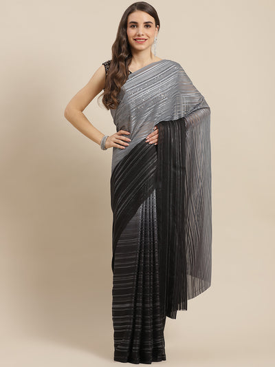 Chhabra 555 Black Ombre Georgette Satin & Lurex Woven Saree With Sequence Embellished Metalic Blouse

Color: Black

Type: NA Sarees

Pattern: Embellished

Pattern Type: Ombre

Ornamentation: Sequinned

Border: No Border

Fabric: Poly Georgette

Saree length: 5.40 mtr., Width: 1.10 mtr, Blouse length: 0.70 mtr
Dry Clean

The CAD image gives a detailed look of the actual blouse piece that comes with this saree. The blouse used by the model in the pictures is only for styling purpose.