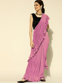 Chhabra 555 Ruffled Pre-Draped Ready to Wear Saree Embellished with Contrast Sequence Blouse

Color: Pink & Black

Type: Sarees

Pattern: Embellished

Pattern Type: Embellished

Ornamentation: Sequinned

Fabric: Viscose Rayon

Pre-stitched saree. Saree fabric length: 5.5 meter, Width: 1.10 mtr, Choli length - 15 inches
Dry Clean Only

The CAD image gives a detailed look of the actual blouse piece that comes with this saree. The blouse used by the model in the pictures is only for styling purpose.