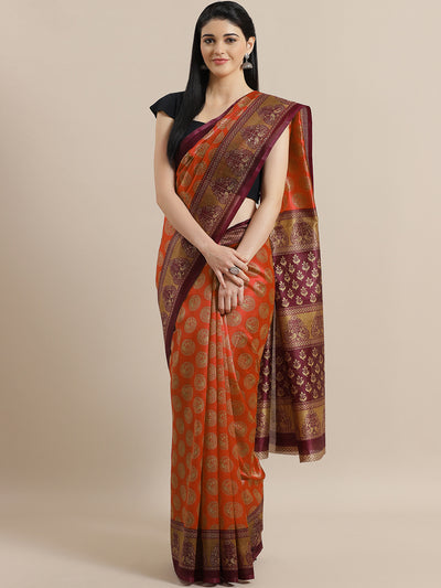 Chhabra 555 Orange Bhagalpuri Silk Digital Printed Saree with Ethnic Peacocks and Mughal Wine Border

Color: Orange

Type: Bhagalpuri Sarees

Pattern: Printed

Pattern Type: Geometric

Ornamentation: NA

Border: Printed

Fabric: Silk Cotton

Saree: 5.35mtr., Width: 1.10 mtr, Blouse: 0.80 mtr
Dryclean Only

The CAD image gives a detailed look of the actual blouse piece that comes with this saree. The blouse used by the model in the pictures is only for styling purpose.