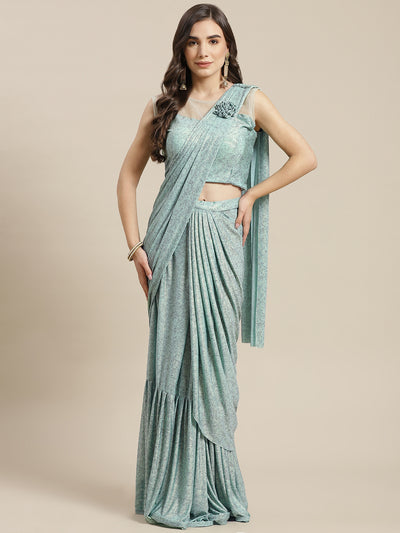Chhabra 555 Ruffled Pre-Stitched Draped Mint Green Shimmer Georgette Embellished Pleated Saree

Color: Sea Green

Type: NA Sarees

Pattern: Printed

Pattern Type: Abstract

Ornamentation: Embroidered

Border: No Border

Fabric: Poly Georgette

Saree length: 5.50 mtr., Width: 1.10 mtr, Blouse Height: 16 inches
Dry Clean only

The CAD image gives a detailed look of the actual blouse piece that comes with this saree. The blouse used by the model in the pictures is only for styling purpose.
