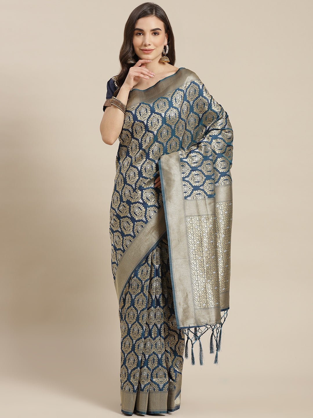 Chhabra 555 Indigo Blue Traditional Banarasi saree with Gold and Silver Zari Mughal motifs

Color: Blue

Type: Banarasi Sarees

Pattern: Woven Design

Pattern Type: Ethnic Motifs

Ornamentation: Zari

Border: Woven Design

Fabric: Silk Blend

Saree length: 5.30 mtr., Width: 1.10 mtr, Blouse length: 0.80 mtr
Dry Clean Only

The CAD image gives a detailed look of the actual blouse piece that comes with this saree. The blouse used by the model in the pictures is only for styling purpose.
