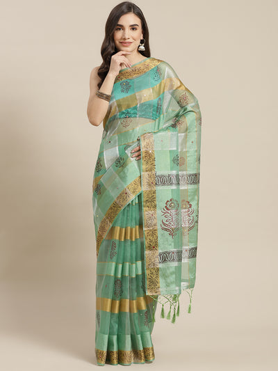 Chhabra 555 Sea Green Block Print Tissue Saree with striped Zari Weaving & Mirror Embellishments

Color: Sea Green

Type: Block Print Sarees

Pattern: Embellished

Pattern Type: Embellished

Ornamentation: Mirror Work

Border: Zari

Fabric: Tissue

Saree length: 5.20 mtr., Width: 1.10 mtr, Blouse length: 0.80 mtr
Dry Clean Only

The CAD image gives a detailed look of the actual blouse piece that comes with this saree. The blouse used by the model in the pictures is only for styling purpose.