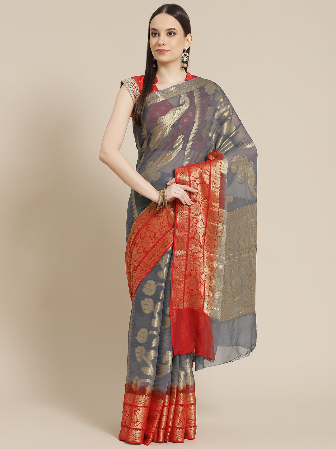 Chhabra 555 Grey Red Ombre Mysore Georgette Handwoven Saree with Peacock Motifs 

Color: Grey

Type: NA Sarees

Pattern: Woven Design

Pattern Type: Woven Design

Ornamentation: NA

Border: Woven Design

Fabric: Georgette

Saree length: 5.70 mtr., Width: 1.10 mtr, Blouse length: 0.80 mtr
Dry Clean only

The CAD image gives a detailed look of the actual blouse piece that comes with this saree. The blouse used by the model in the pictures is only for styling purpose.