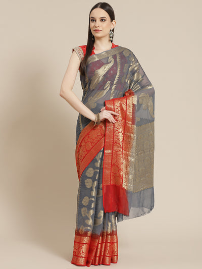Chhabra 555 Grey Red Ombre Mysore Georgette Handwoven Saree with Peacock Motifs 

Color: Grey

Type: NA Sarees

Pattern: Woven Design

Pattern Type: Woven Design

Ornamentation: NA

Border: Woven Design

Fabric: Poly Georgette

Saree length: 5.70 mtr., Width: 1.10 mtr, Blouse length: 0.80 mtr
Dry Clean only

The CAD image gives a detailed look of the actual blouse piece that comes with this saree. The blouse used by the model in the pictures is only for styling purpose.