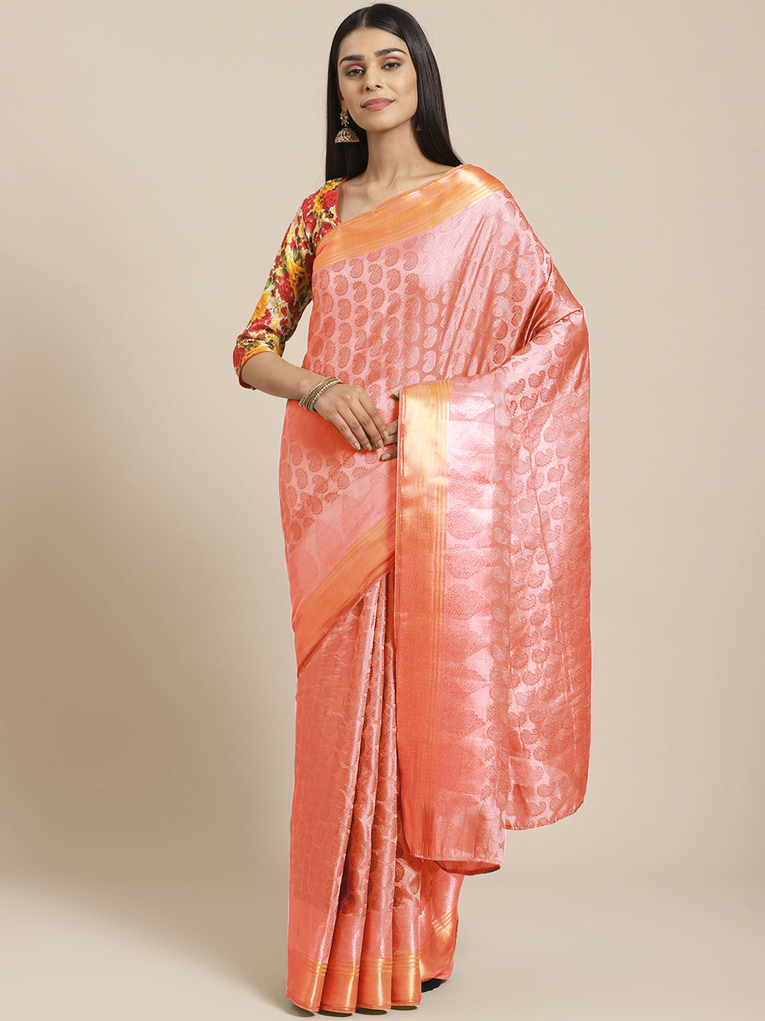 Chhabra 555 Banarasi Jamdani Embossed Handloom Saree with Paisley Resham Weaving & Woven Zari Border

Color: Peach

Type: Jamdani Sarees

Pattern: Woven Design

Pattern Type: Paisley

Ornamentation: Zari

Border: Woven Design

Fabric: Silk Blend

Saree: 5.4 mtr., Width: 1.1 mtr, Blouse: 0.7 mtr
Dry Clean Only

The CAD image gives a detailed look of the actual blouse piece that comes with this saree. The blouse used by the model in the pictures is only for styling purpose.