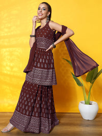 Chhabra 555 Foil Print Peplum Style Georgette Gharara Set with Peplum Style Pleated Tassled Kurta