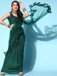 Chhabra 555 Ruffled Pre-Stitched Draped Bottle Green Tulle Saree with Sequin Embellished blouse

Color: Bottle Green

Type: Ruffled Half-and-Half Saree
Pattern: Embellished
Ornamentation: Sequinned
Fabric: Net

Saree length: 5.40 mtr., Width: 1.10 mtr, Blouse Height: 14 inches
Dry Clean only. Net part of the saree contains Nylon threads

The CAD image gives a detailed look of the actual blouse piece that comes with this saree. The blouse used by the model in the pictures is only for styling purpose.