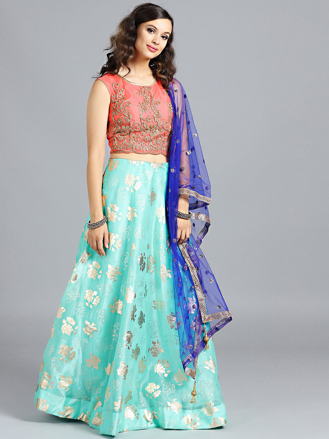 Chhabra 555 Sea Green & Orange Foil Printed Tissue Hand Embroidered Stitched Lehenga Choli With Heavy Net Dupatta