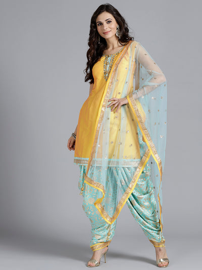 Chhabra 555 Yellow Embroidered Silk Kurta With printed Sharara and tasseled dupatta